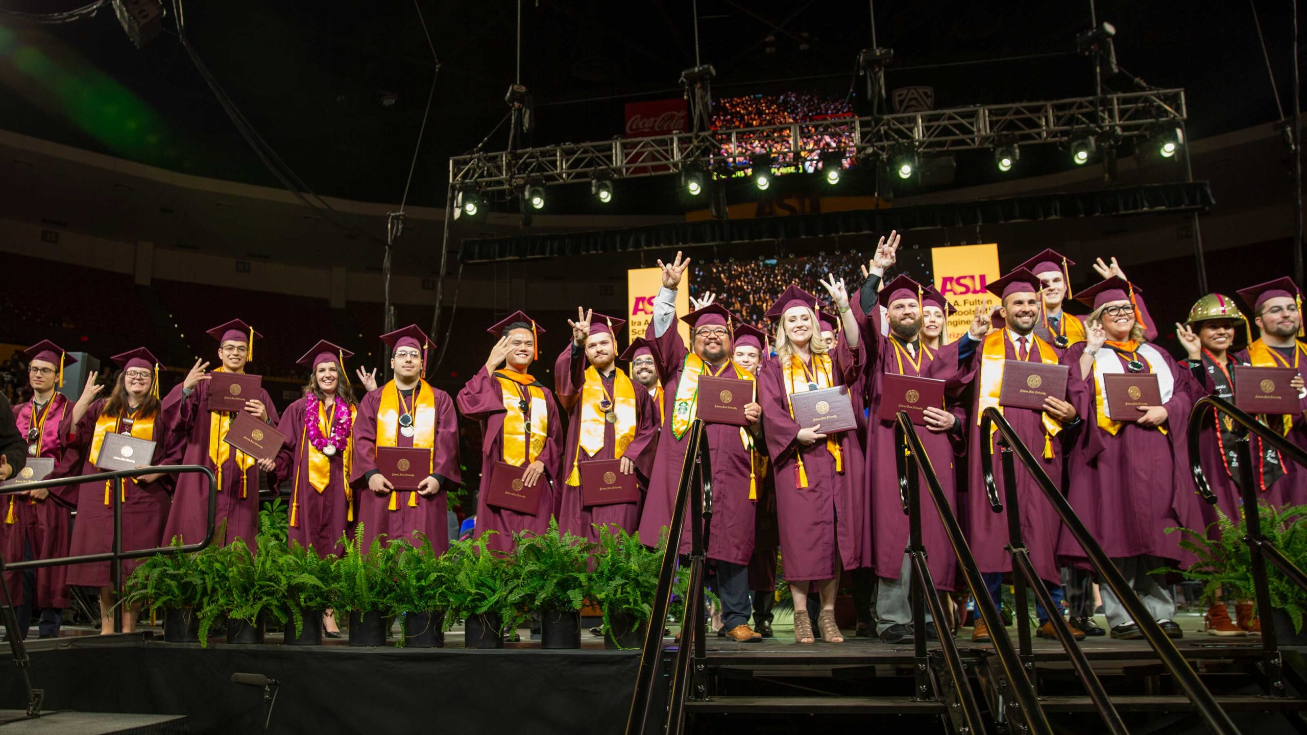 The stage at Convocation 2019 full of outstanding graduates celebrating at the end of the ceremony