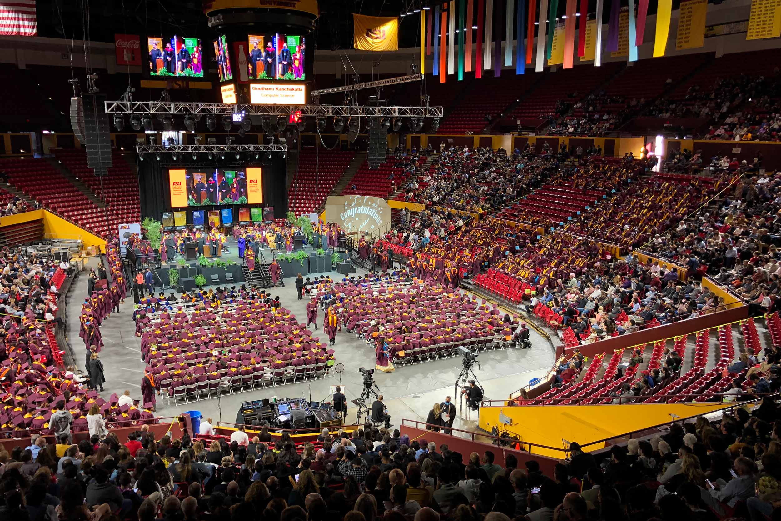 View of the entire Desert Financial Arena filled with graduates and their supporters during the Fall 2021 Fulton Schools Convocation ceremony